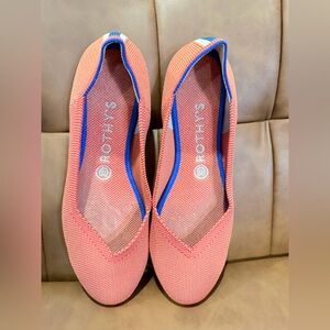 Rothy's Vibrant Orange Flats with Blue Trim